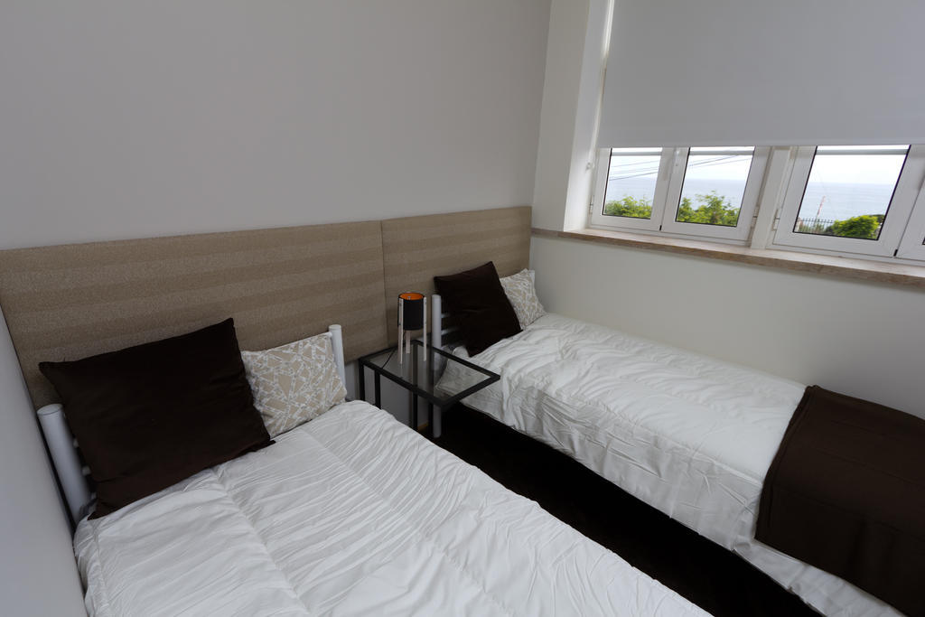 埃斯托利尔 图里斯莫赛库洛旅馆酒店 客房 照片 A bedroom