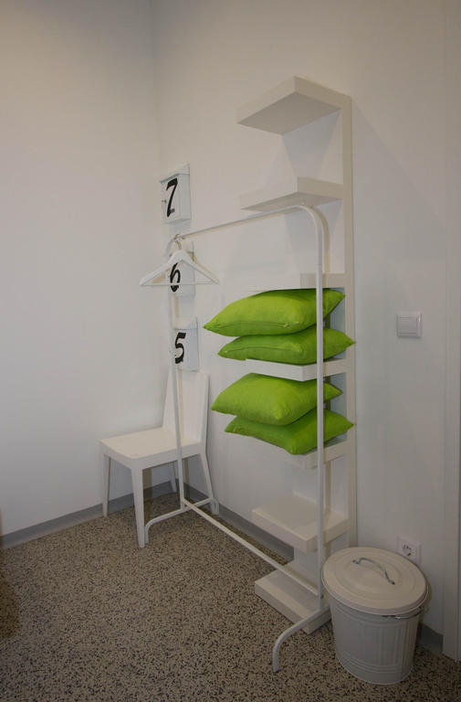 埃斯托利尔 图里斯莫赛库洛旅馆酒店 客房 照片 A coat rack with a chair